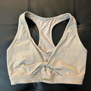 Gym shark Whitney Simmons cream sports bra.